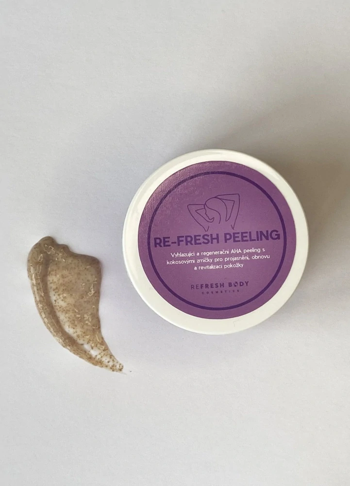 Vyhlazující a regenerační AHA peeling s kokosovými zrníčky pro projasnění, obnovu a revitalizaci pokožky 
